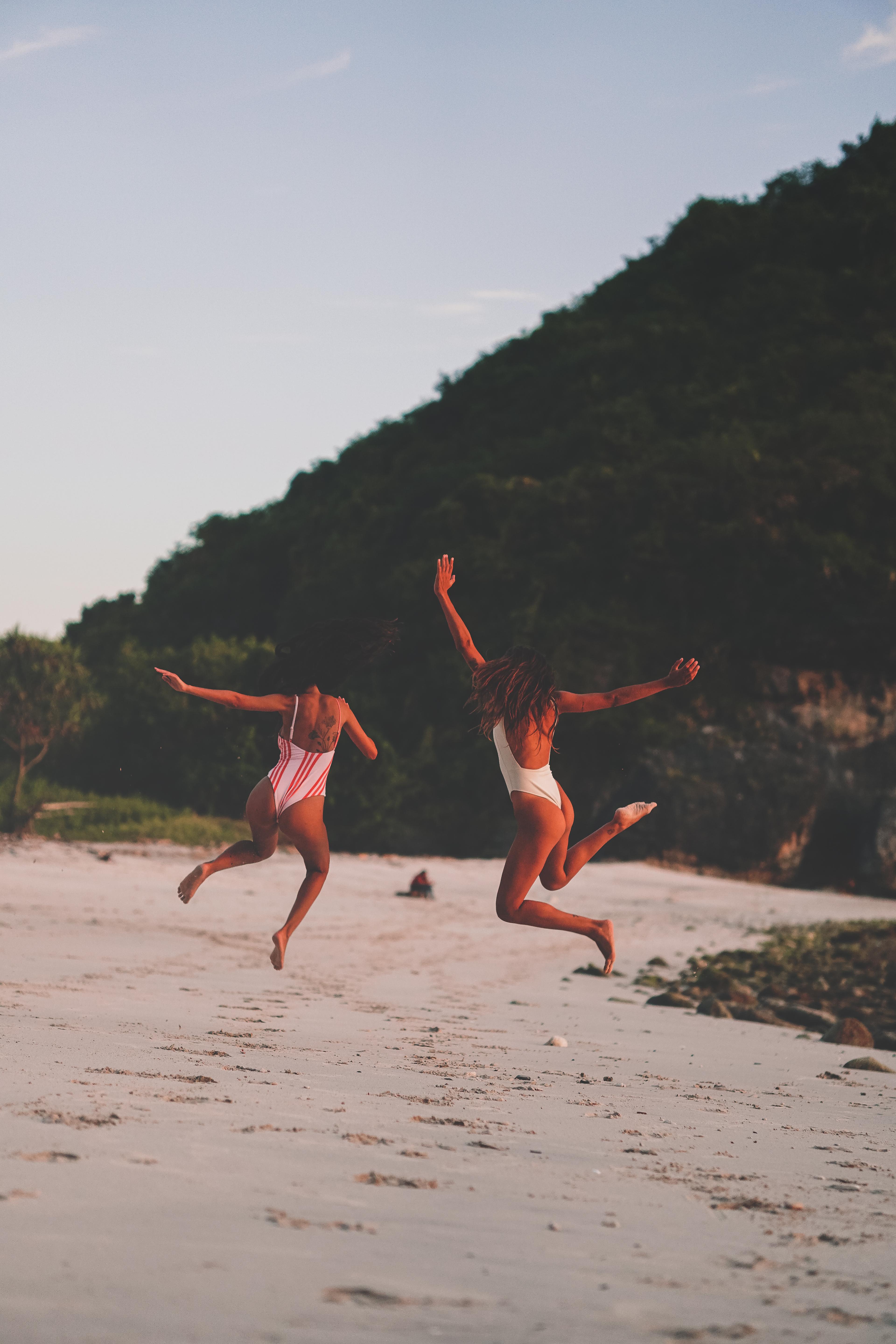 Surfers at sunset in Lombok